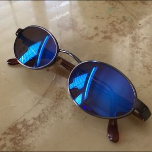 Vintage Revo Blue Mirrored oval sunglasses .